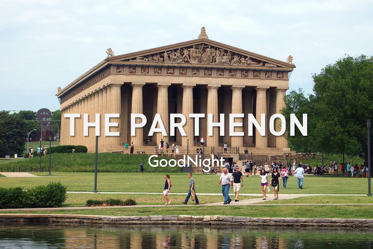 The image features The Parthenon in Centennial Park, with people walking and enjoying the park’s scenic reflective water surface. The setting glows with sunset light, and the park is buzzing with visitors engaged in leisure activities.